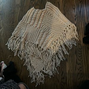 Gorgeous hand knit poncho, small or medium size. Shorter in the front long back